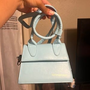 Baby blue cross body bag